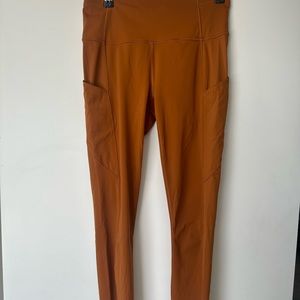BURNT ORANGE/COPPER LULULEMON fast and frees with side pockets+reflective detail